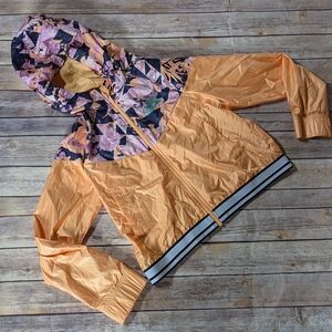 Nike Sportswear Windrunner Big Kids' (girls') Graphic Jacket In Orange